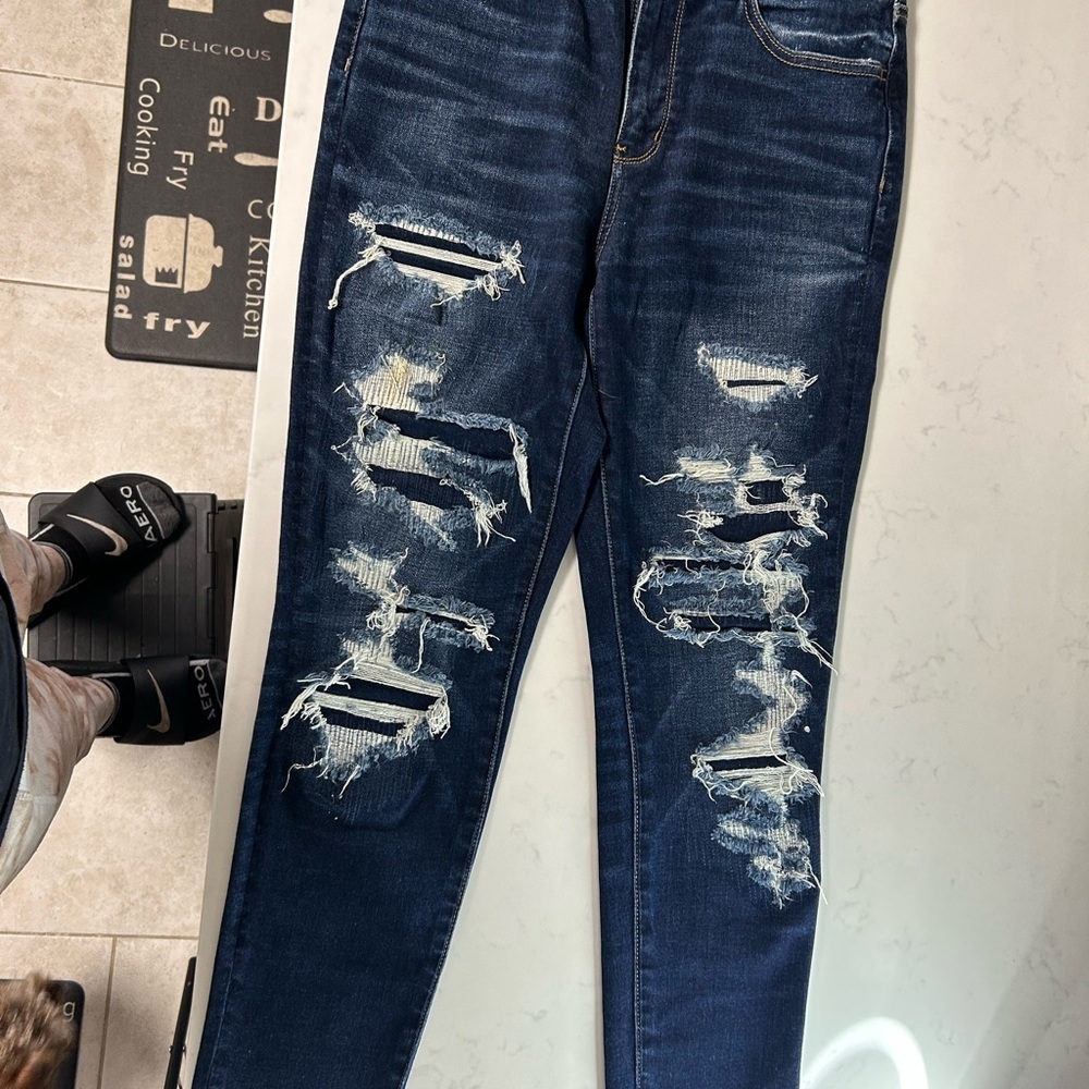Distressed Blue Jeans